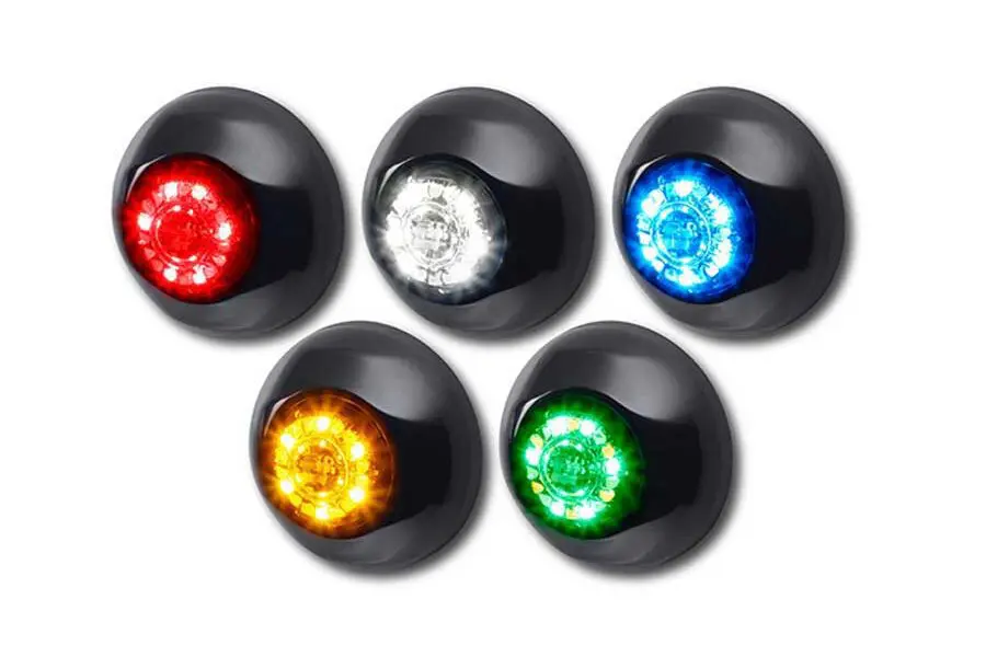 Emergency vehicle LED lights in multiple colors: red, white, blue, amber, and green.