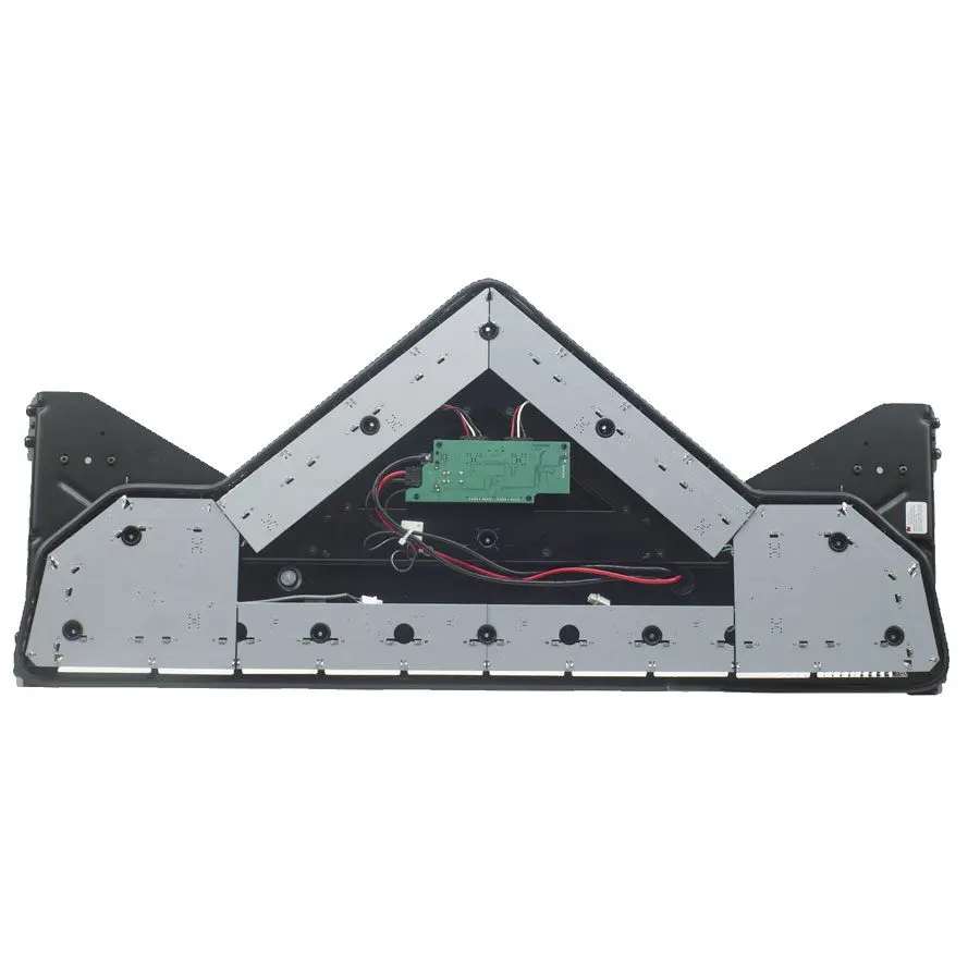 The Valor LED Light Bar by FedSig features a metal triangular device with a green circuit board in the center, surrounded by a black frame and visible wiring, indicating it is an electronic component or part of a larger system.