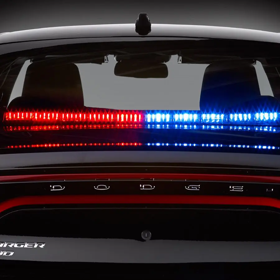 CN SignalMaster directional lights equipped on a Dodge Charger, displaying red and blue warning lights.