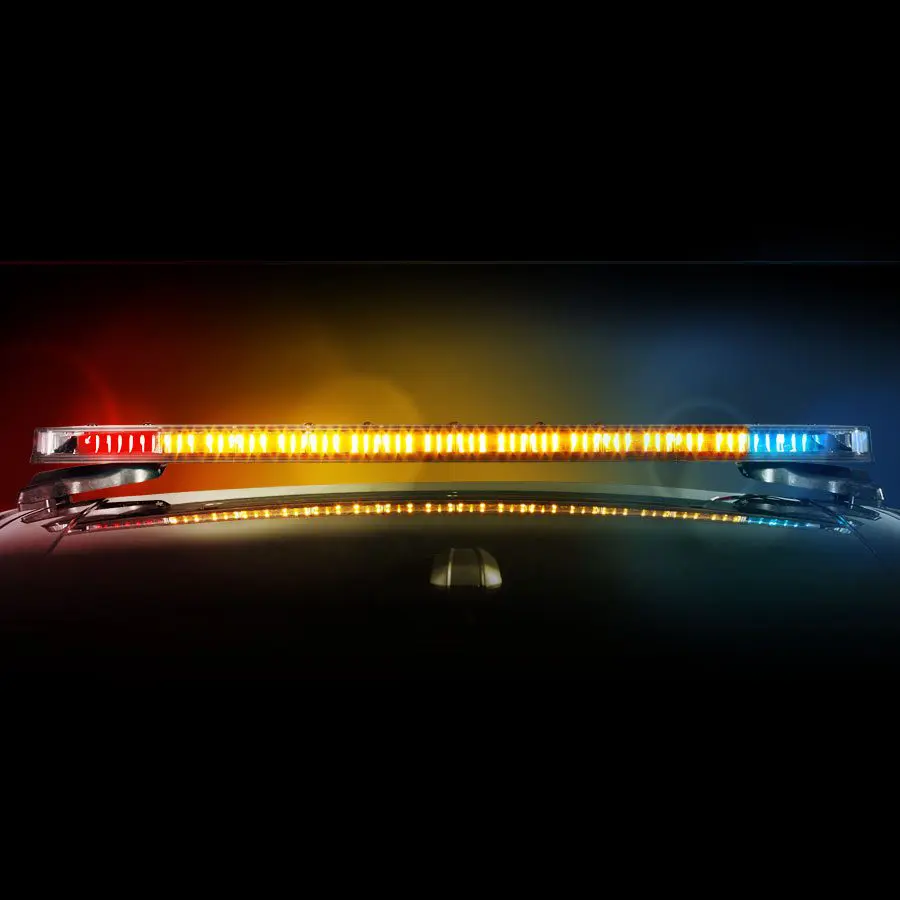 The FedSig Integrity LED Light Bar shines in red, yellow, and blue lights against a dark background.