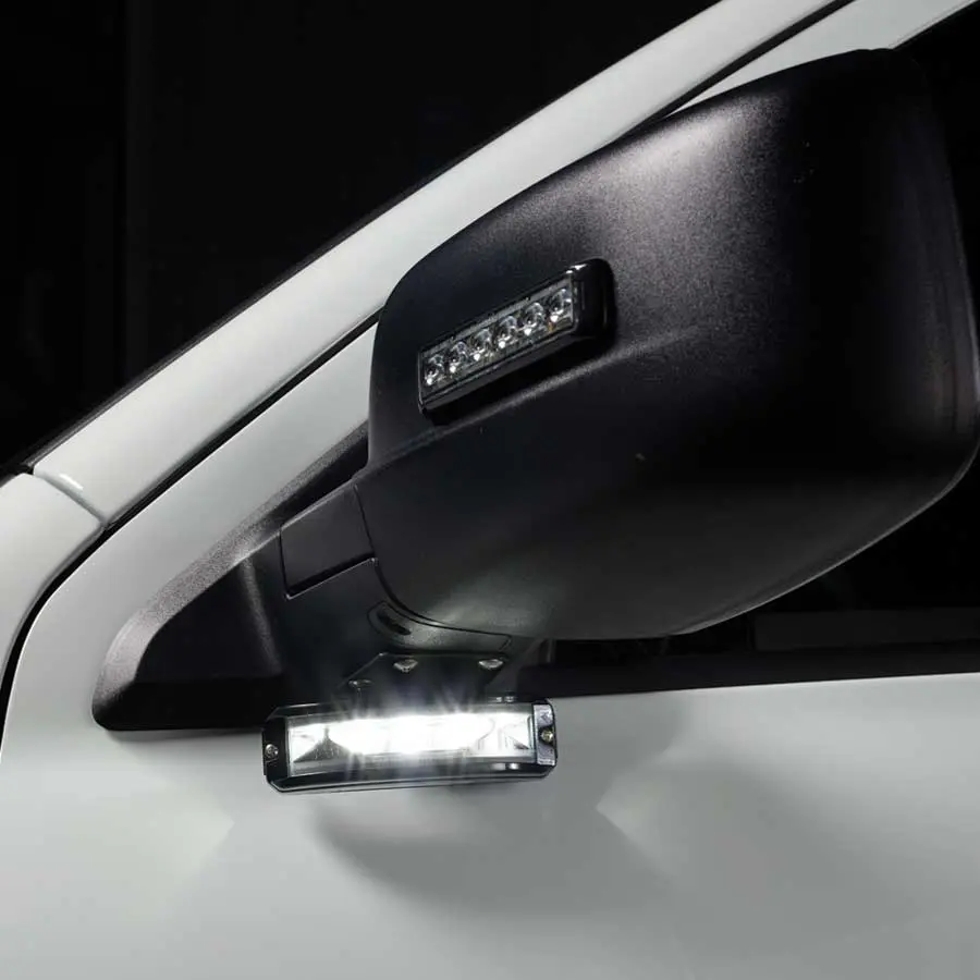 MicroPulse Wide Angle Lights mounted on a side-view mirror.