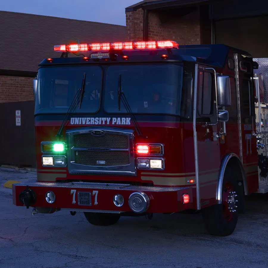 Emergency light bar mounted on top of a vehicle