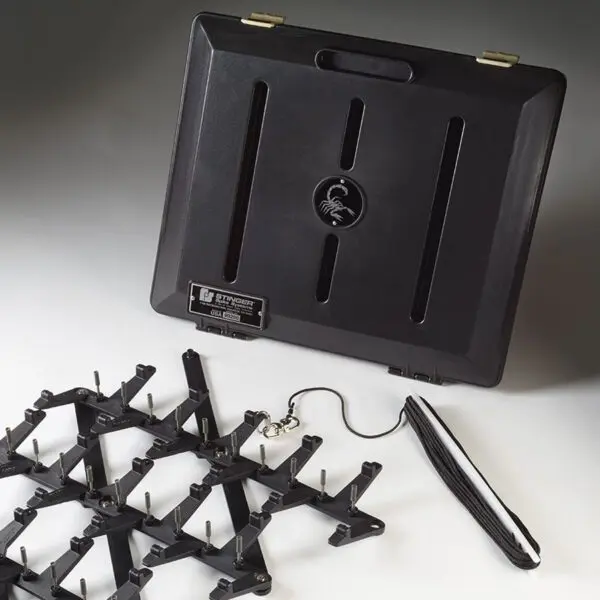 Stinger spike system for tire deflation