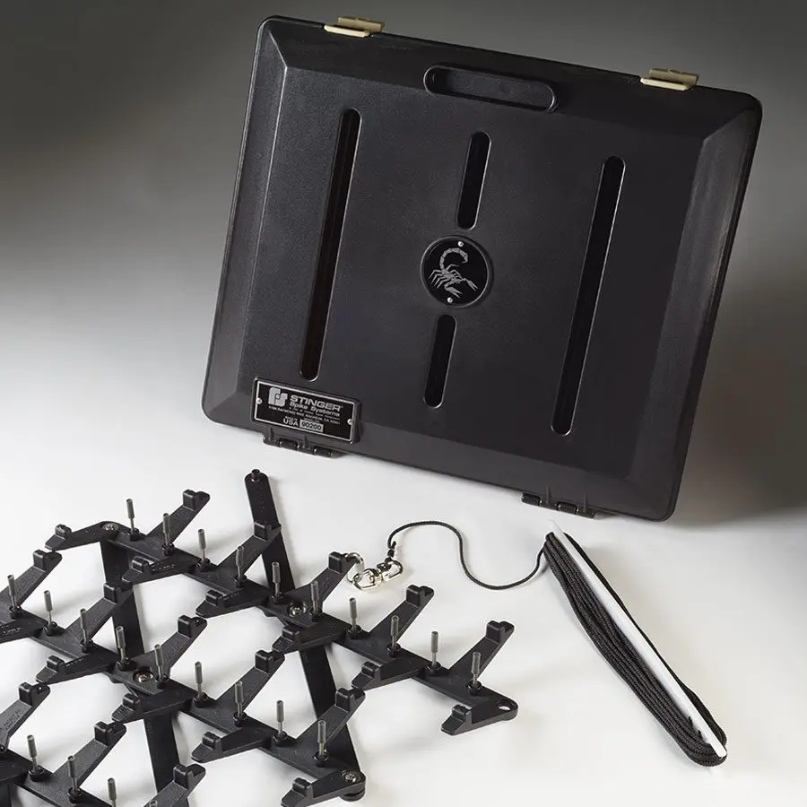 Stinger spike system for tire deflation
