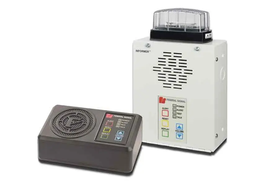 Two electronic devices: a gray rectangular "Informer IP Enabled" speaker by FedSig with buttons labeled Normal, High, Alert, and a white box with a vent and a clear cover on top, both used for alerts or alarms.