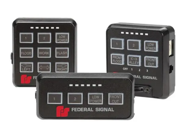 Three black rectangular Federal Signal control keypads with labeled buttons for functions such as flood, work, flash, low power, and directional controls—ideal for operating a warning light bar—are shown from different angles.