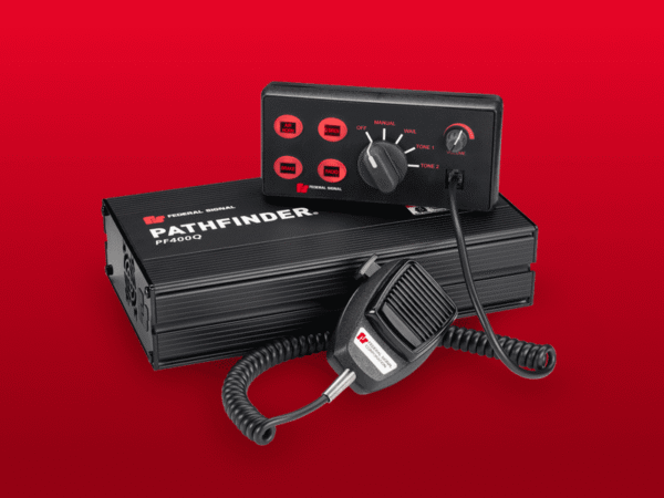 A black Federal Signal Pathfinder PF400Q electronic control box with attached microphone and manual control panel against a red background.