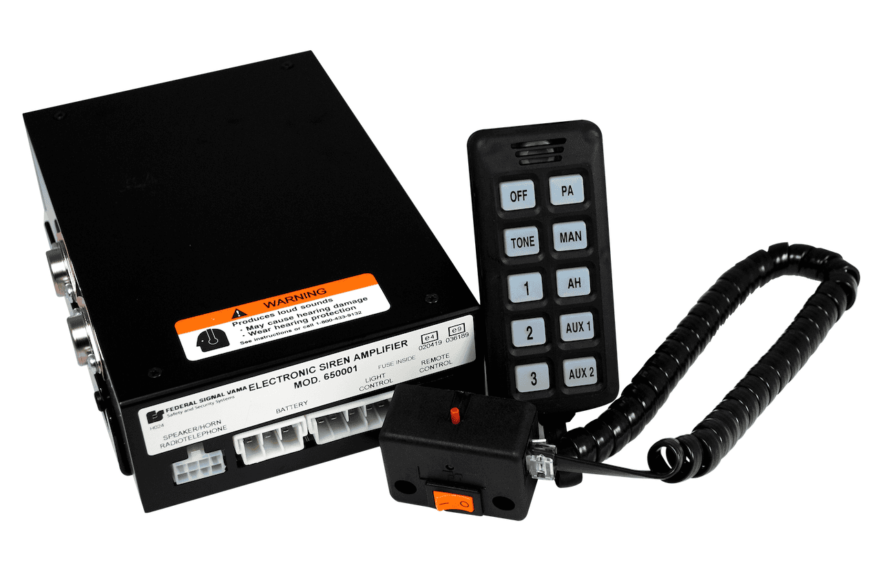 Electronic siren amplifier system with a control unit featuring labeled buttons, a coiled cable, and a warning label on the main amplifier box.