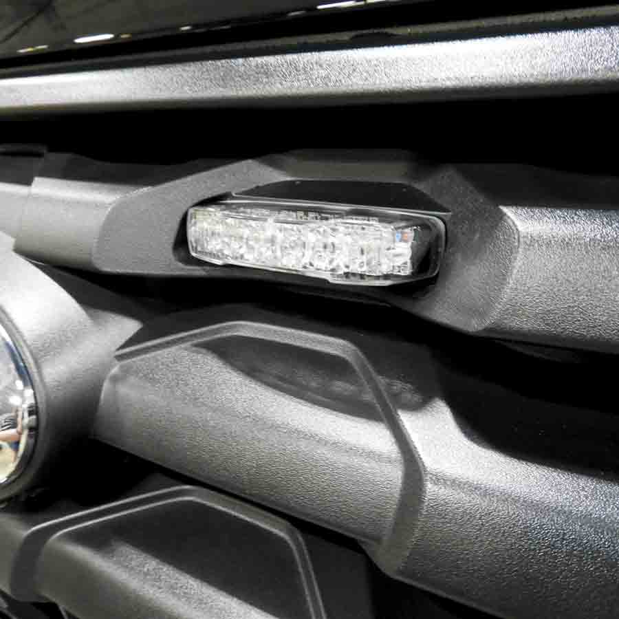 MicroPulse C Series LED warning light installed in the grille of a Police Interceptor Ford Utility.
